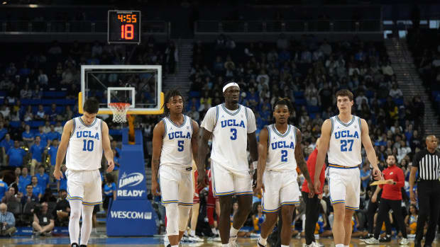 Brandon Williams (5) Adem Bona (3) Dylan Andrews (2) Jan Vide ucla men's basketball
